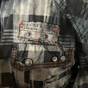 Large men’s shirt made by Focus USA INC